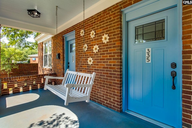 335-337 S Woodrow St, Columbia, SC 29205 - property entrance with covered porch and brick siding