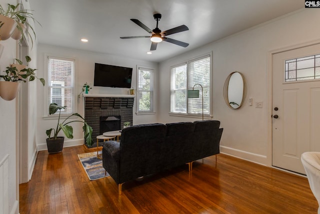 335-337 S Woodrow St, Columbia, SC 29205 - living room with hardwood / wood-style flooring, a fireplace, ceiling fan, recessed lighting, and crown molding