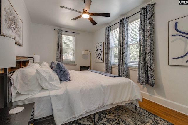 335-337 S Woodrow St, Columbia, SC 29205 - bedroom with wood finished floors and a ceiling fan