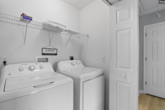 3 Fonthill Ct, Columbia, SC 29229 - laundry room featuring washer and clothes dryer, attic access, and light wood-type flooring
