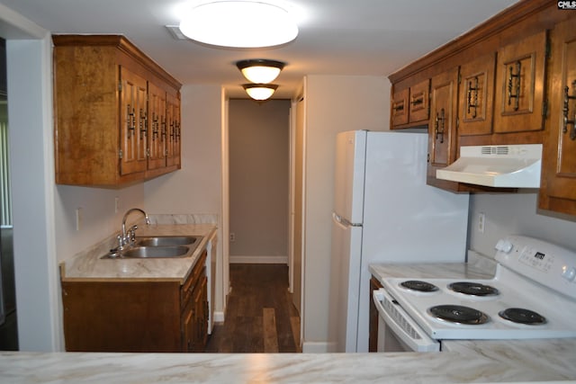 169 Lionsgate Rd, Columbia, SC 29223 - kitchen featuring white electric range, under cabinet range hood, light countertops, and brown cabinetry