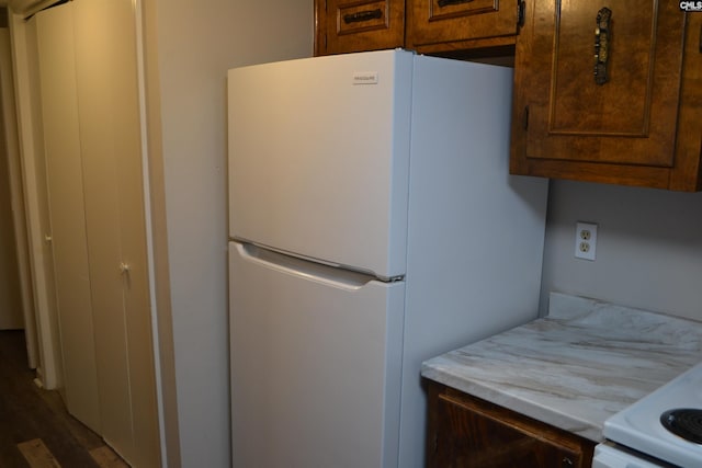 169 Lionsgate Rd, Columbia, SC 29223 - kitchen with freestanding refrigerator, light countertops, and wood finished floors
