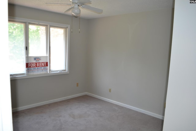 169 Lionsgate Rd, Columbia, SC 29223 - carpeted empty room with plenty of natural light and a ceiling fan