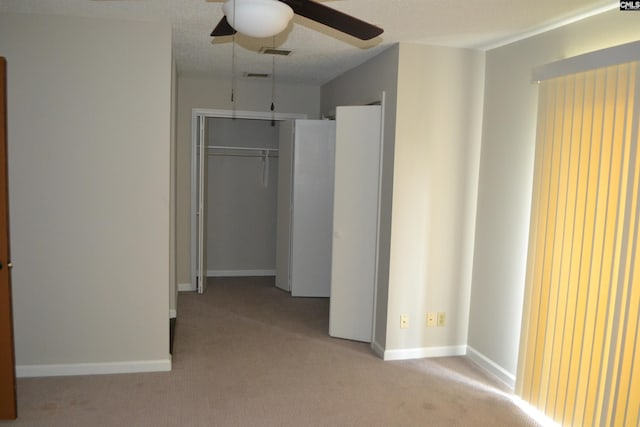 169 Lionsgate Rd, Columbia, SC 29223 - unfurnished bedroom with carpet floors, a closet, and a ceiling fan
