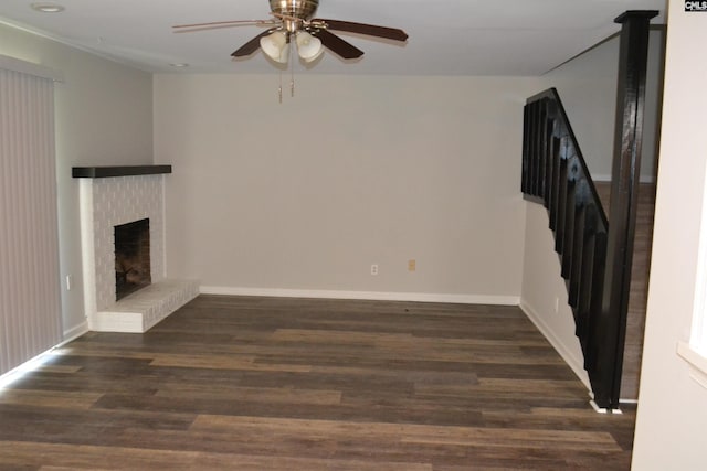 169 Lionsgate Rd, Columbia, SC 29223 - unfurnished living room with a ceiling fan, a brick fireplace, wood finished floors, stairs, and recessed lighting