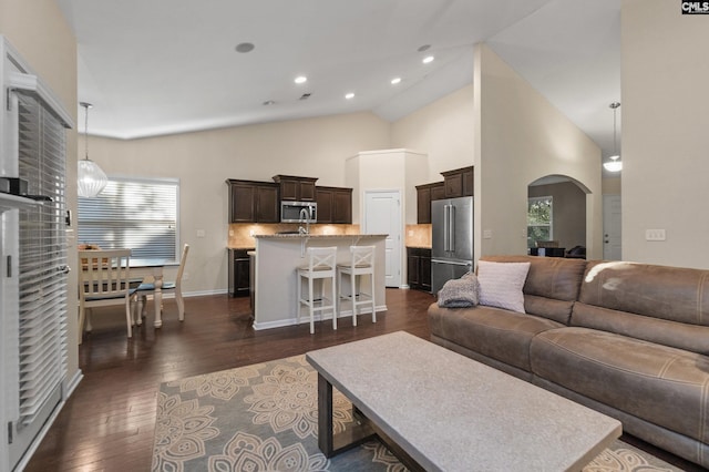 6 Genessee Ct, Irmo, SC 29063 - living room featuring arched walkways, recessed lighting, dark wood-style floors, and high vaulted ceiling