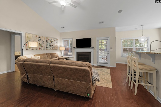 6 Genessee Ct, Irmo, SC 29063 - living room featuring dark wood finished floors, a glass covered fireplace, ceiling fan, and high vaulted ceiling