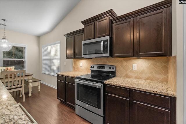 6 Genessee Ct, Irmo, SC 29063 - kitchen featuring appliances with stainless steel finishes, lofted ceiling, dark brown cabinetry, decorative backsplash, and dark wood-style floors