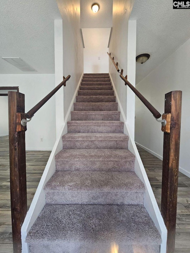 11 Long Glen Ct, Columbia, SC 29229 - stairs featuring a textured ceiling and wood finished floors