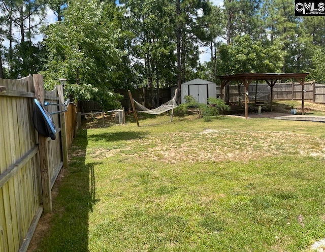 11 Long Glen Ct, Columbia, SC 29229 - fenced backyard featuring a storage shed and a gazebo