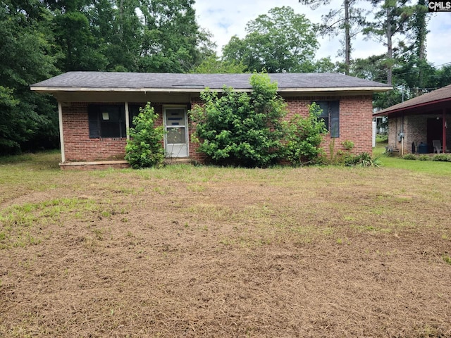 110 Quattlebaum Ave, Ridge Spring, SC 29129 - ranch-style home with brick siding and a front yard