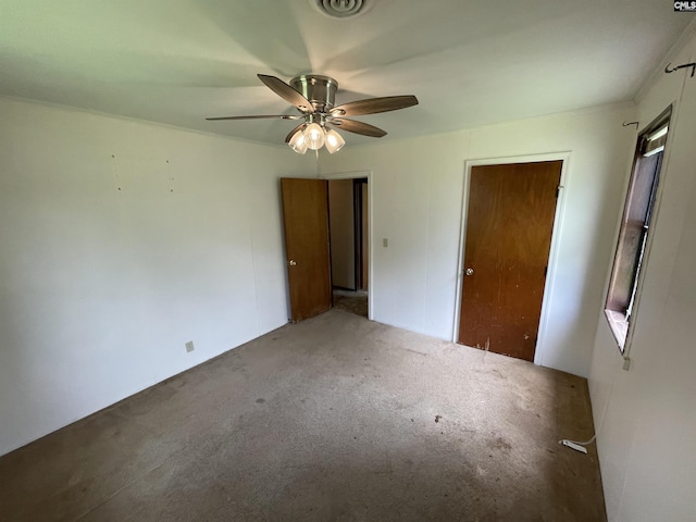 110 Quattlebaum Ave, Ridge Spring, SC 29129 - unfurnished bedroom with carpet and a ceiling fan
