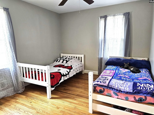 904 Sunnyhill Dr, Camden, SC 29020 - bedroom featuring wood finished floors and a ceiling fan
