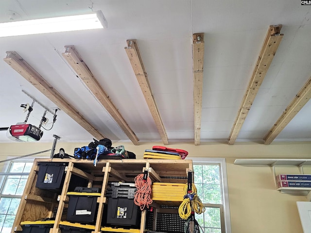 904 Sunnyhill Dr, Camden, SC 29020 - garage view of a garage door opener and beamed ceiling
