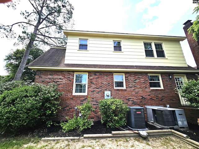904 Sunnyhill Dr, Camden, SC 29020 - rear view of property featuring brick siding and roof with shingles