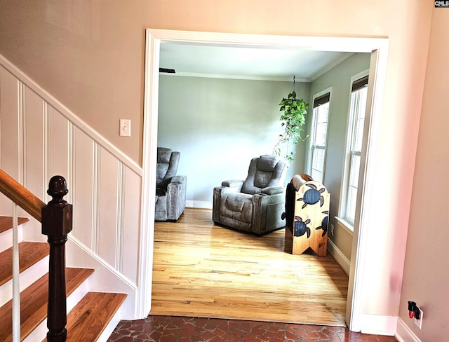 904 Sunnyhill Dr, Camden, SC 29020 - foyer entrance with stairs, healthy amount of natural light, ornamental molding, and wood finished floors