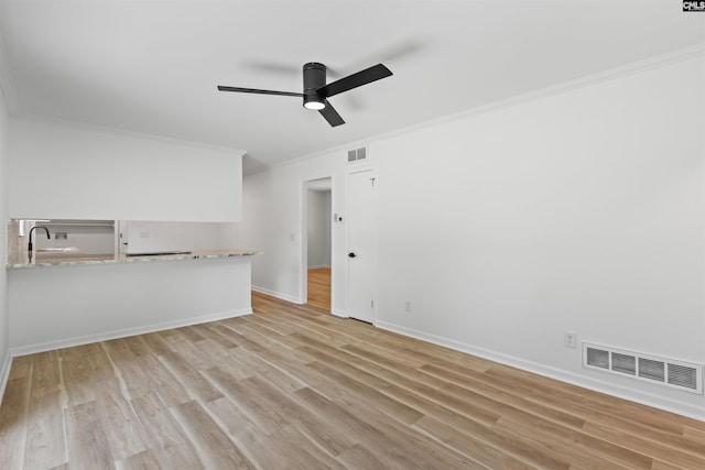 2109 Sheffield Ln, Cayce, SC 29033 - spare room with ornamental molding, light wood-style flooring, and a ceiling fan