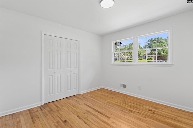2109 Sheffield Ln, Cayce, SC 29033 - unfurnished bedroom featuring light wood finished floors and a closet