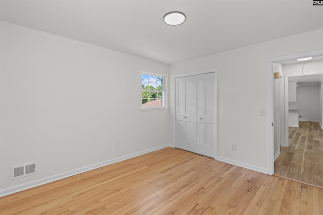 2109 Sheffield Ln, Cayce, SC 29033 - unfurnished bedroom featuring light wood finished floors and a closet