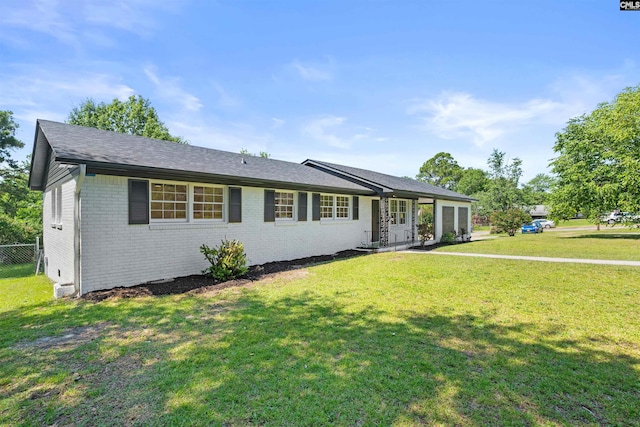 2109 Sheffield Ln, Cayce, SC 29033 - ranch-style home with brick siding, a garage, and a shingled roof