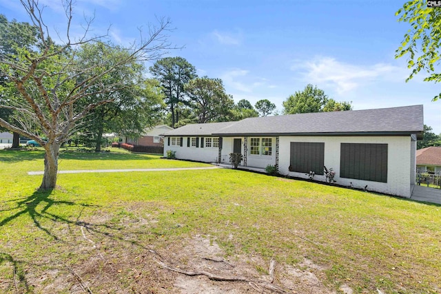 2109 Sheffield Ln, Cayce, SC 29033 - ranch-style house with a front lawn and brick siding