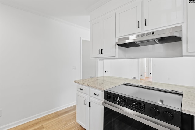 2109 Sheffield Ln, Cayce, SC 29033 - kitchen featuring under cabinet range hood, stainless steel range with electric stovetop, ornamental molding, light wood-style flooring, and white cabinets