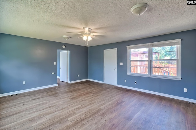 914 Hook Ave, West Columbia, SC 29169 - empty room with a ceiling fan, wood finished floors, and a textured ceiling