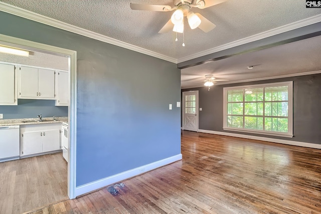914 Hook Ave, West Columbia, SC 29169 - spare room with a ceiling fan, light wood-type flooring, a textured ceiling, and ornamental molding