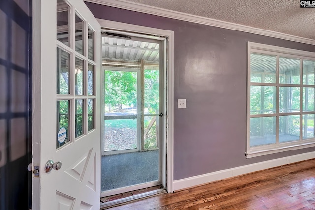 914 Hook Ave, West Columbia, SC 29169 - doorway to outside with wood finished floors, crown molding, and a textured ceiling
