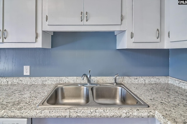 914 Hook Ave, West Columbia, SC 29169 - kitchen with white cabinets, light countertops, and backsplash