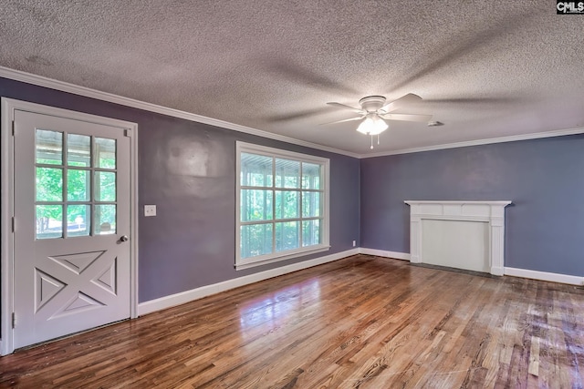 914 Hook Ave, West Columbia, SC 29169 - unfurnished living room with plenty of natural light, a ceiling fan, wood finished floors, crown molding, and a textured ceiling
