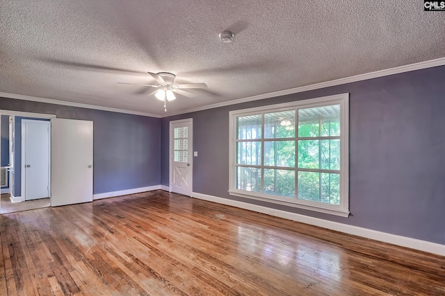 914 Hook Ave, West Columbia, SC 29169 - spare room featuring a smoke detector, crown molding, hardwood / wood-style floors, a ceiling fan, and a textured ceiling