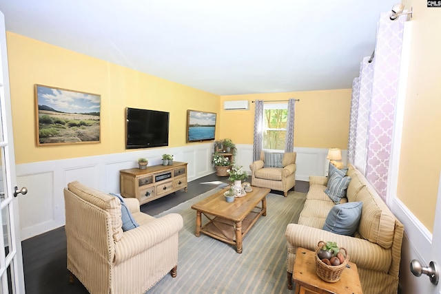 214 Mac St, Leesville, SC 29070 - living area featuring a decorative wall, a wainscoted wall, and a wall unit AC