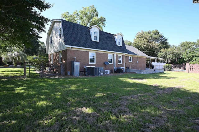 214 Mac St, Leesville, SC 29070 - back of house featuring brick siding and a shingled roof