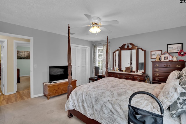 122 Partridge Hill Dr, West Columbia, SC 29172 - carpeted bedroom featuring a closet, a ceiling fan, and a textured ceiling