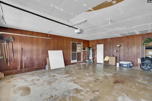 122 Partridge Hill Dr, West Columbia, SC 29172 - garage with wooden walls and a garage door opener