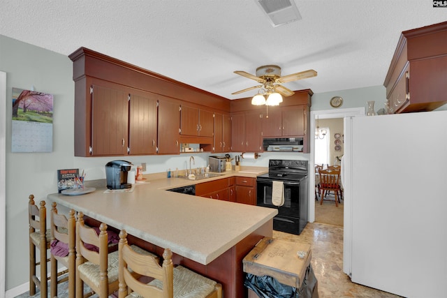122 Partridge Hill Dr, West Columbia, SC 29172 - kitchen with black appliances, ventilation hood, a peninsula, ceiling fan, and light countertops