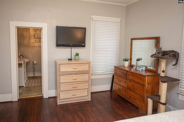 616 Mcrae Rd, Camden, SC 29020 - bedroom featuring dark wood finished floors, ornamental molding, and ensuite bath