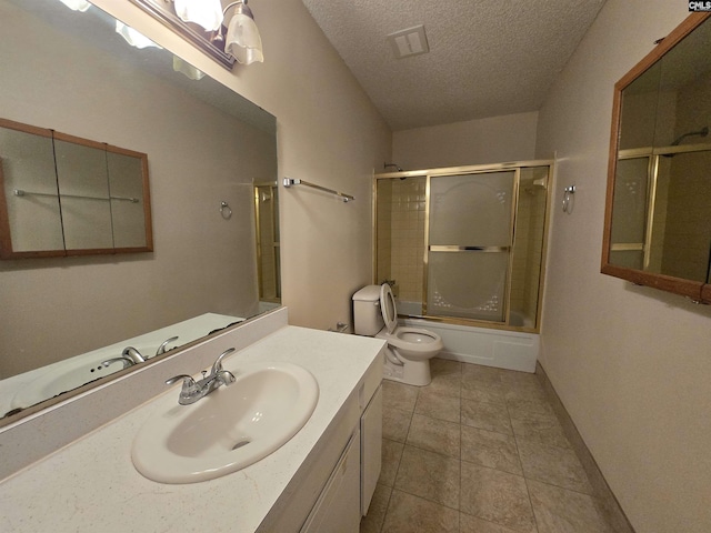 3630 Ranch Rd Unit 5-6, Columbia, SC 29206 - full bath with a textured ceiling, bath / shower combo with glass door, vanity, and tile patterned floors