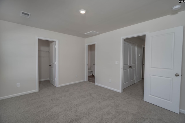 739 Wild Duck Ln, Columbia, SC 29203 - unfurnished bedroom featuring a spacious closet, carpet floors, ensuite bath, and a closet