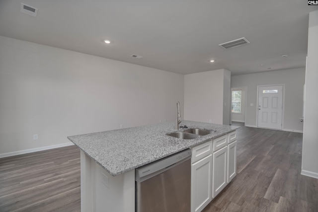 739 Wild Duck Ln, Columbia, SC 29203 - kitchen featuring stainless steel dishwasher, dark wood-style flooring, a center island with sink, white cabinetry, and light stone counters
