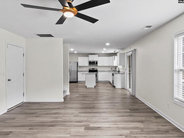 393 Denman Loop, Columbia, SC 29229 - unfurnished living room with recessed lighting, a ceiling fan, and light wood-style flooring