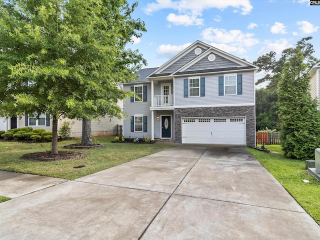 393 Denman Loop, Columbia, SC 29229 - view of front of house with stone siding, concrete driveway, an attached garage, a front yard, and a balcony