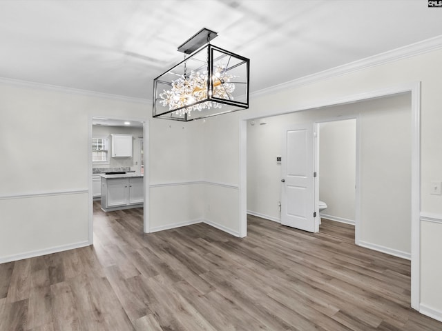 393 Denman Loop, Columbia, SC 29229 - unfurnished dining area with wood finished floors, a chandelier, and crown molding