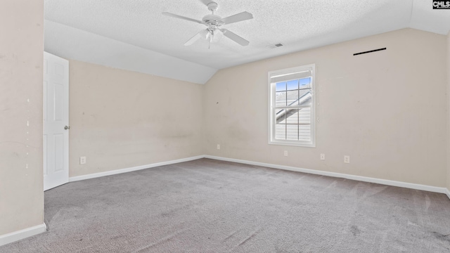 339 Cornflower Dr, Columbia, SC 29229 - carpeted spare room featuring vaulted ceiling, ceiling fan, and a textured ceiling