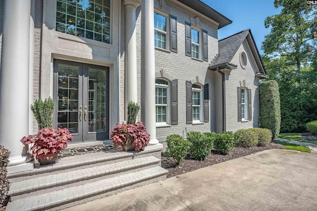 226 Forty Love Pt, Chapin, SC 29036 - view of exterior entry with french doors, brick siding, and stone siding