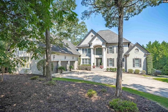 226 Forty Love Pt, Chapin, SC 29036 - french country style house with driveway and a garage