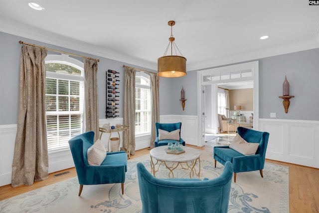 226 Forty Love Pt, Chapin, SC 29036 - living area with a wainscoted wall, crown molding, light wood-style flooring, and recessed lighting