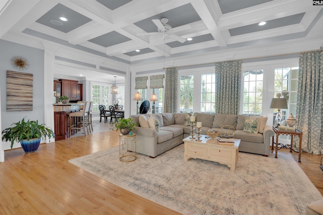 226 Forty Love Pt, Chapin, SC 29036 - living room with light wood-style floors, coffered ceiling, beam ceiling, crown molding, and a ceiling fan