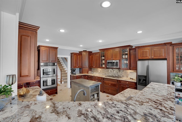 226 Forty Love Pt, Chapin, SC 29036 - kitchen featuring appliances with stainless steel finishes, decorative backsplash, ornamental molding, glass insert cabinets, and recessed lighting